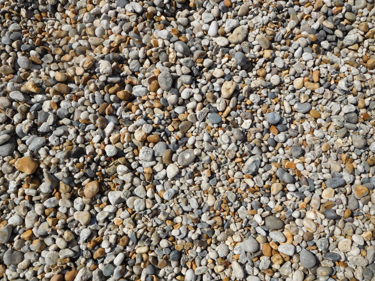 Rocks on the beach instead of sand at Charlestown Beach in England.