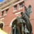A different view of the sculpture which shows the angel's raised hand A different view of the sculpture which shows the angel's raised hand
