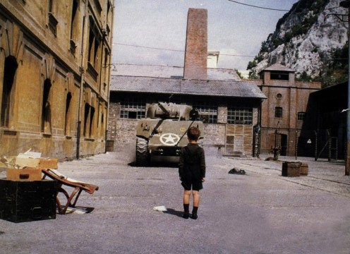 The meaningful scene with the boy and the tank.
