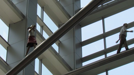 Another one of the climbing statues that are featured in the ceiling of the Comcast Center.