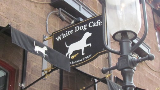 The sign outside of "White Dog CafÃ©" located at 3420 Samson St., Philadelphia, Pa.