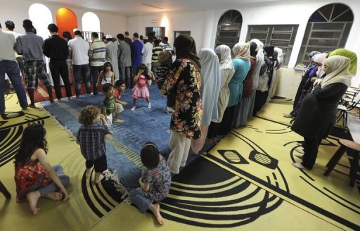 Muslims in Brazil praying together. 