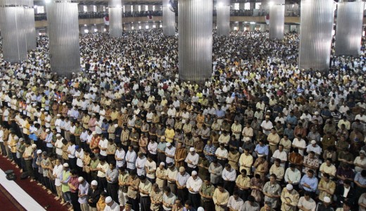 Muslims in Indonesia during Ramadan praying.  