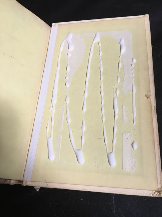 It doesn't take a lot of glue to stick the pages to the back cover.