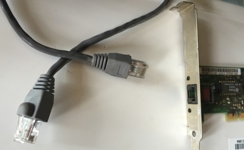  RJ-45 connectors attached to an Ethernet cable