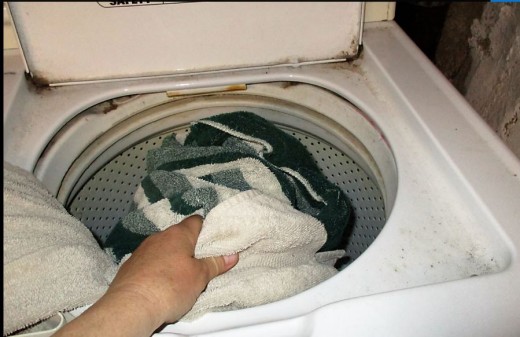 Placing Clothes in Washing Machine - Put Dry lightweight Clothes in - Pull Heavy, wet Clothes out, do sideways motion to put in Dryer