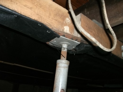 A common used post not approved for under a main supporting beam.