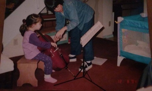 This is my mom and I around 2001 or so, teaching me "open strings" 
