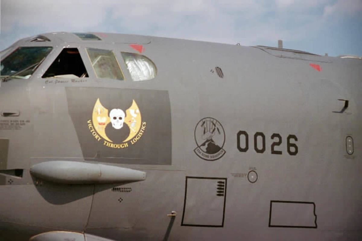 Nose art on a B-52, tail number 0026.