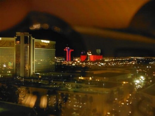 After we got back from the heli tour. The Vegas strip from our window, through my lens. I love how it reflects.