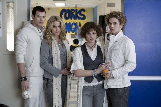 from left to right: Emmett Cullen, Rosalie Hale,  Alice Cullen, Jasper Hale. 