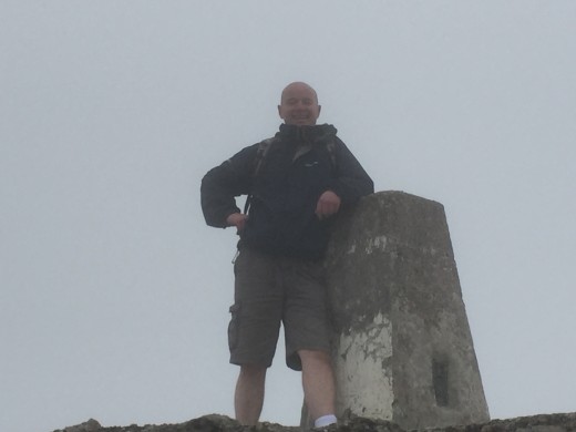 Another of Rob at the summit trig point.