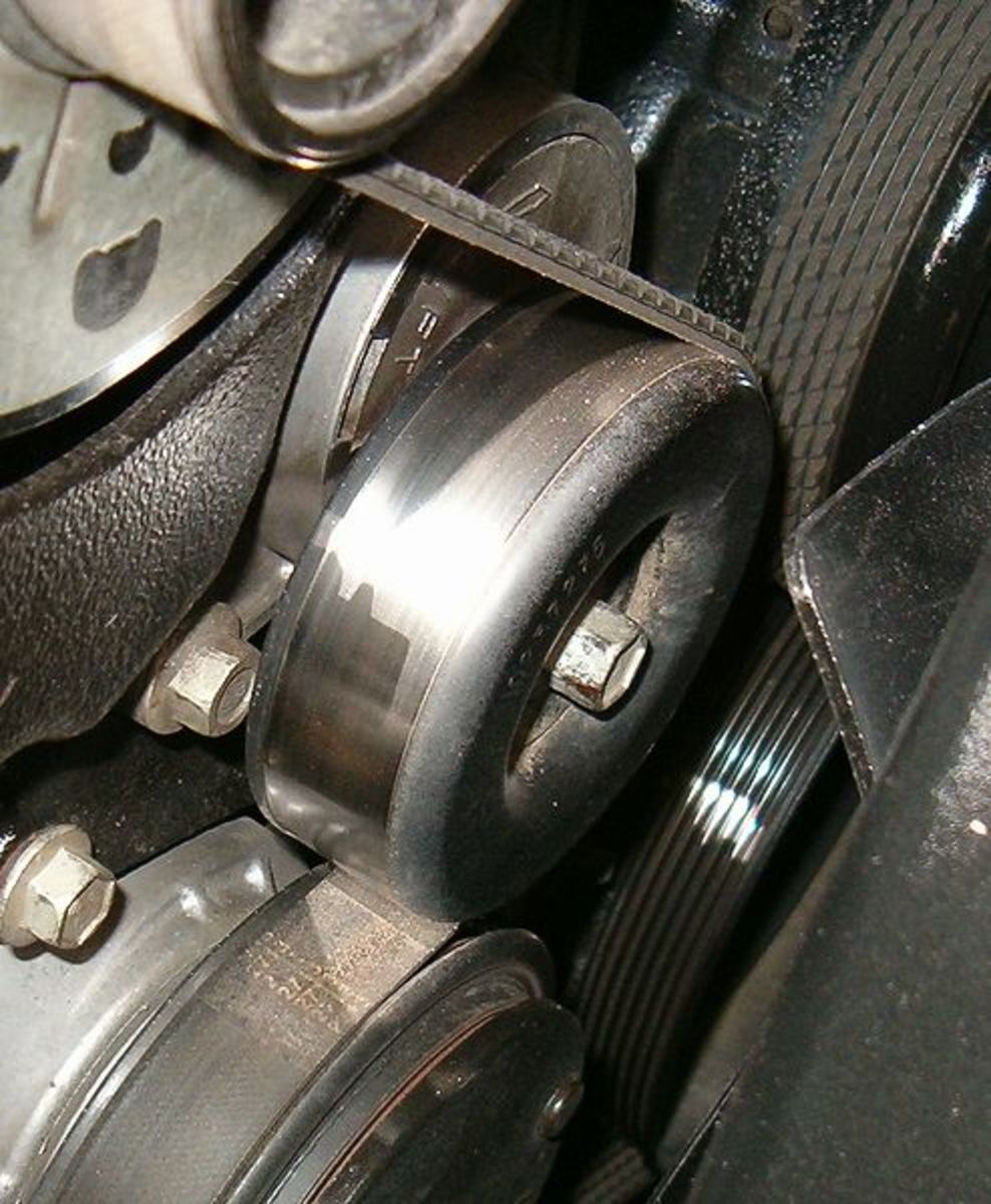 Check the drive belt for adjustment and tensioner for proper operation.