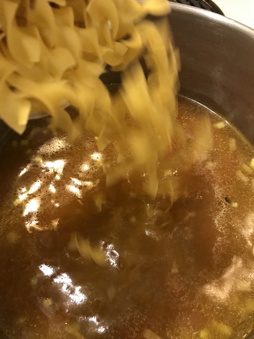Add the broth back to the pot, and bring it to a simmer, Add the noodles and cook about 10 minutes. We love the wide egg noodles - they're inexpensive, store well and taste great.