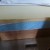 The cover is pulled back, showing the rather rough edge where the topper was shortened. The cover is pulled back, showing the rather rough edge where the topper was shortened.