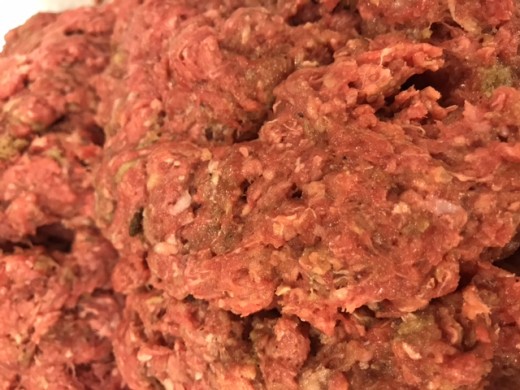 The main reason to mix binders together before adding them to the ground beef is so that you can get an even distribution without overworking the ground beef. Over mixing will make the patties tough.