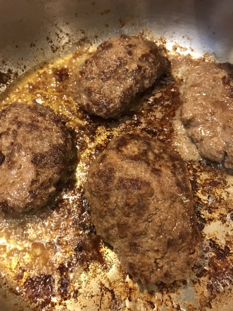 It's OK to slightly under cook the patties at this point, since you'll be letting them rest while you make the sauce, and rewarming them in the gravy. Just make sure you get a nice crust for flavor.