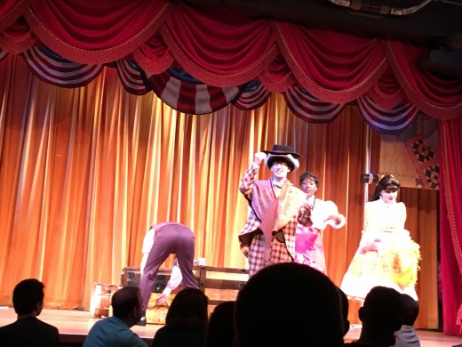 There are six actors that are mainly in pairs that sing and dance their way through different American folk songs. They are constantly trying to upstage each other and it is hilarious. 