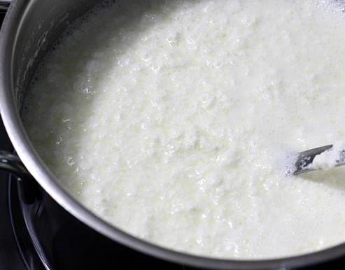 Curdling the milk after adding the souring agent