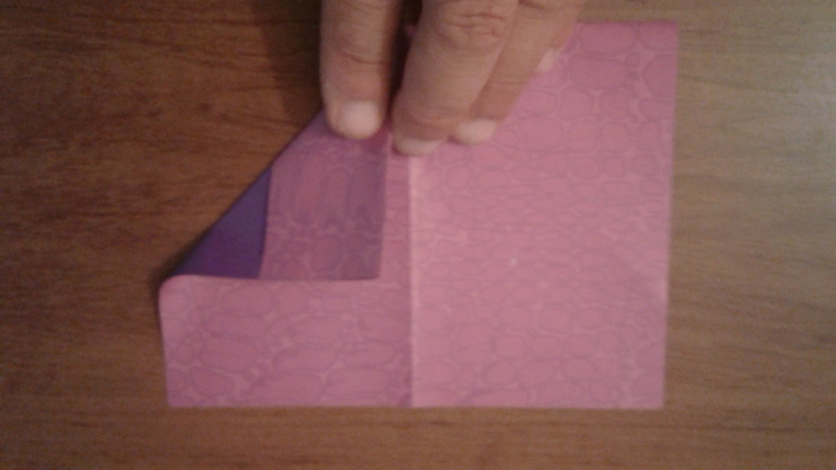 After flipping, fold one corner down