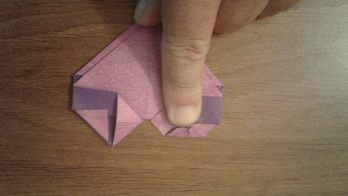 now fold down the "tops" of the triangles