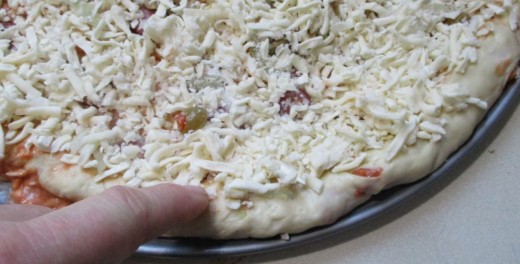 make sure your cheese covers your ingredients and goes to edge of pizza