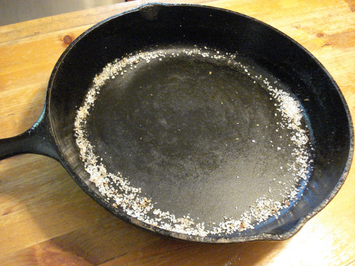 Use a mixture of salt and water to properly clean your cast iron pan.