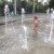 Children's water play. Gym in the background. Children's water play. Gym in the background.