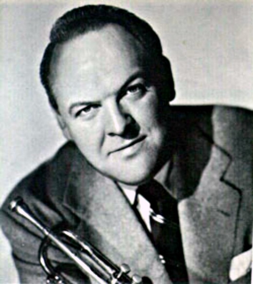 With the great help from the American composer, arranger and trumpeter Billy May the razzle-dazzle is completely spell bounding. 