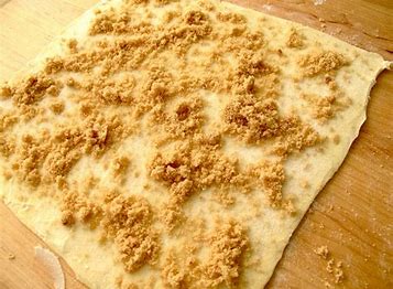 puff pastry with cinnamon and sugar sprinkled on it