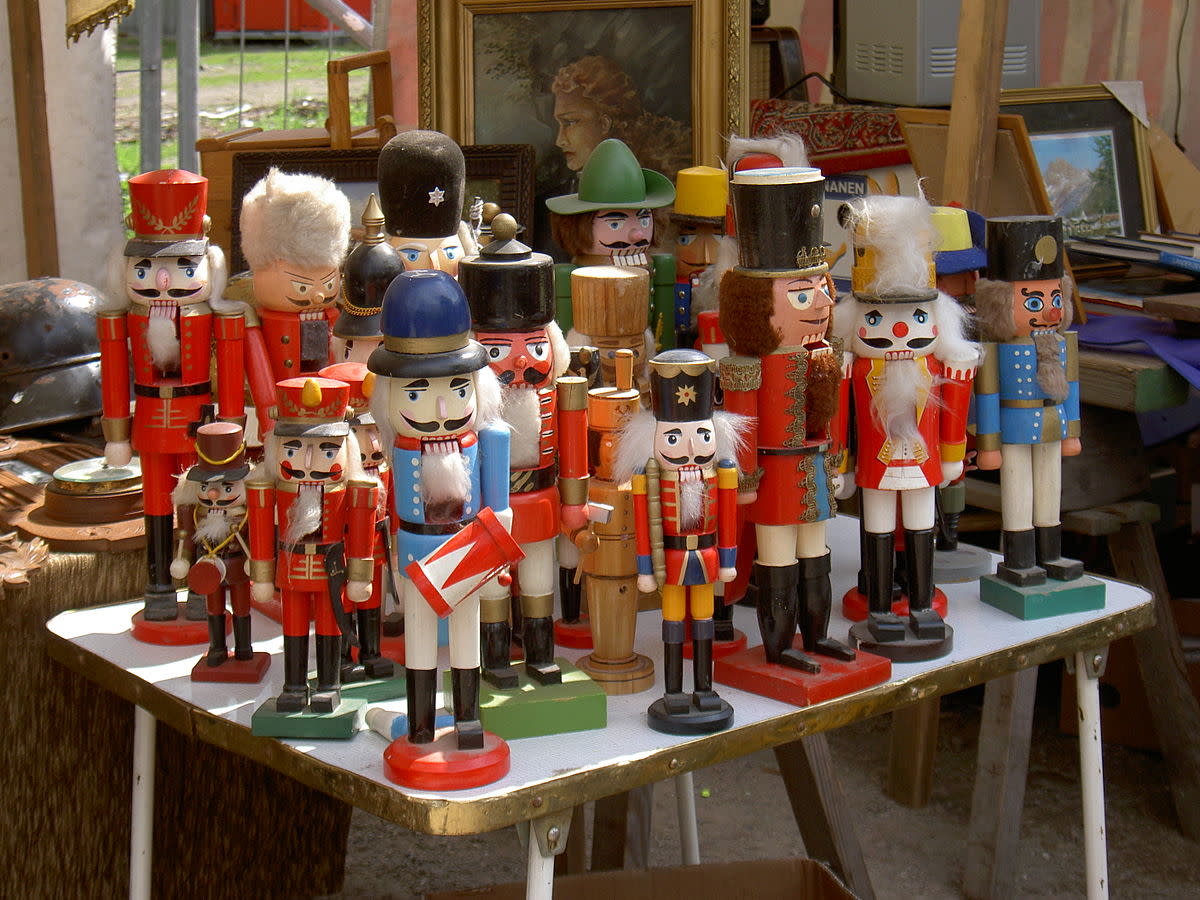 A group of older wooden nutcrackers, in the shape of soldiers. Photographed at a flea market in Berlin, Germany, 2006.