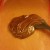 After melting the chocolate and cooling it again, I pour the chocolate into heaps like these on each of the sheets of toffee before spreading. After melting the chocolate and cooling it again, I pour the chocolate into heaps like these on each of the sheets of toffee before spreading.