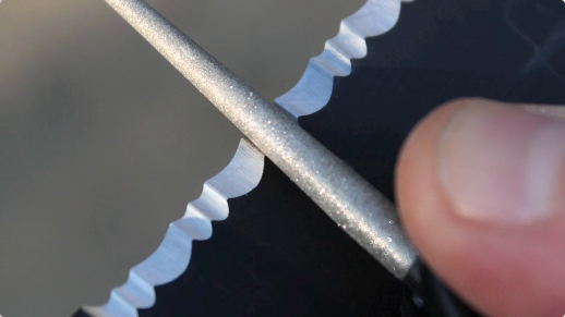 Serrated edges make cutting cord, limbs etc. much easier, but sharpening can be a headache.  Tools such as the Bear Grylls Field Sharpener can make this task a breeze.