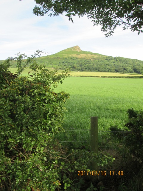 Classic view of Roseberry Topping from Newton-under-Roseberry's eastern car park by the Guisborough road