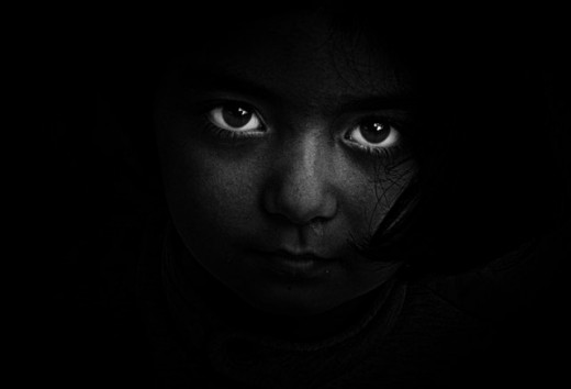 A Young Girl in the Shadows