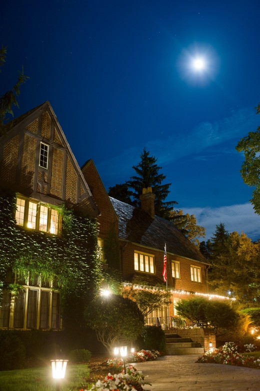 The English Inn exterior at night in moonlight