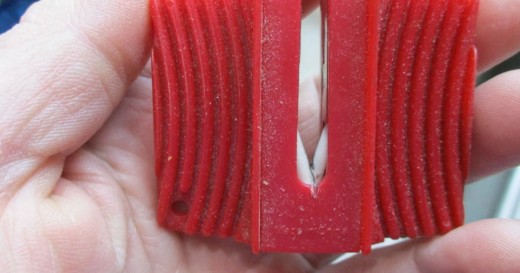 different shaped sharpener that comes with blades, but does not get used at all. See the white sharpening stones?