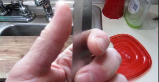 If you gently brush your thumb against the blade, you can feel it pull against your finger. Not a good practice, since if you aren't lucky, you will end up with a cut to your thumb. Safety first!