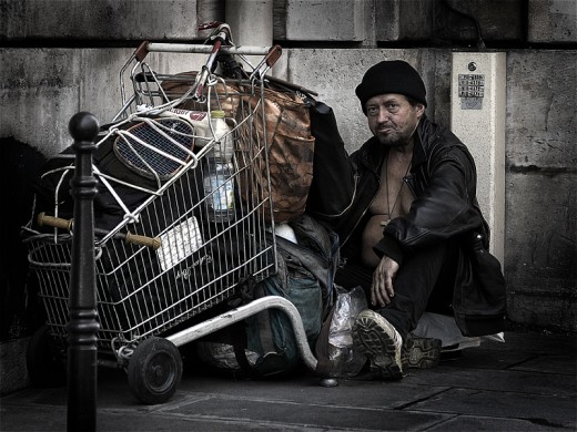 a homeless guy , a down-and-outer, in Paris