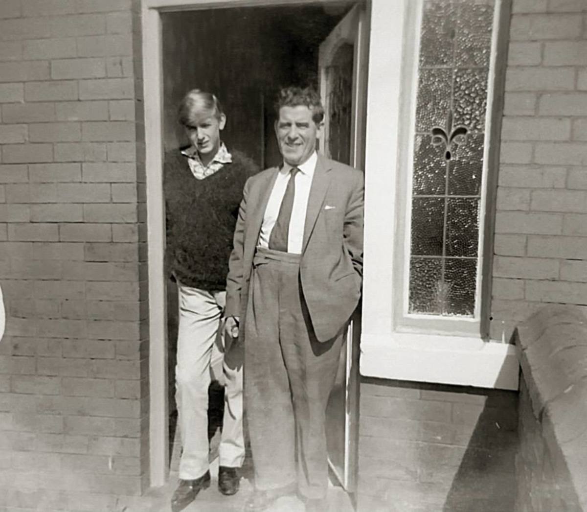 Eric with our granddad on our front doorstep in the house where we grew up