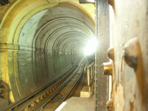 Thames Tunnel [ This happens to be the FIRST underwater TUNNEL that is credited to three MEN. ]