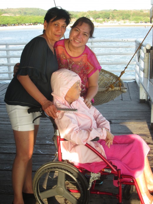 Lola and two of her daughters enjoy the ocean air in a cabin at Stilts