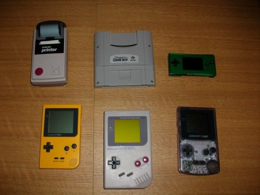 From top left to bottom-right:  Game Boy printer, Super Gameboy, Gameboy Micro, Gameboy Pocket Yellow, Gameboy Original, Gameboy Color.