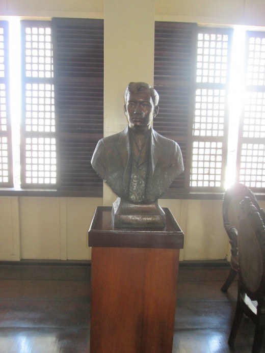 A  brass statue of Jose Rizal in his home in Calamba.