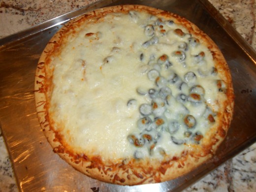 This yummy pizza is really easy to make at home. This was an all mushroom and 1/2 black olive pizza and it was delicious!