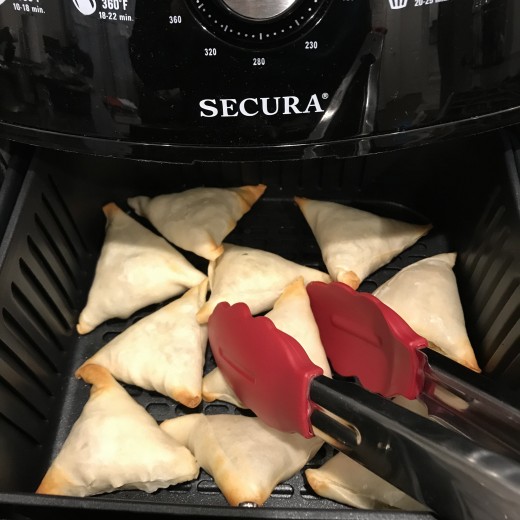 Turning the Samosa's.