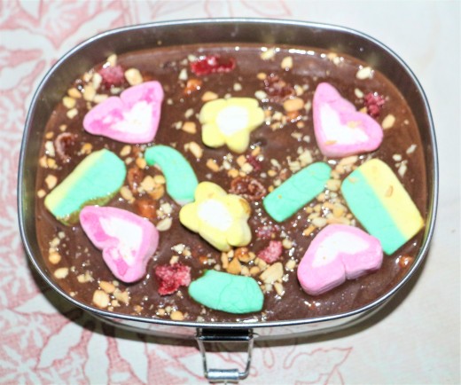 Decorated with Marshmallows, chopped peanuts and chopped Jujubs/ Jelly Drops