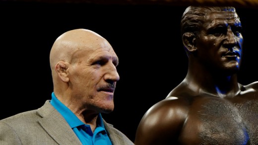 Bruno Sammartino, standing next to a statue in his likeness, during Wrestlemania Axxess week in April, 2014.