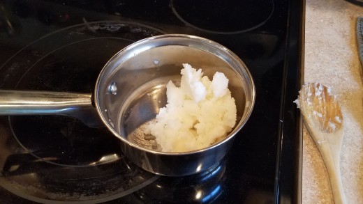 Melt 1 cup in a saucepan on the stove over medium low heat.
