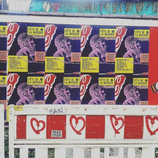 Colorful posters plastered over Berlin's walls. 